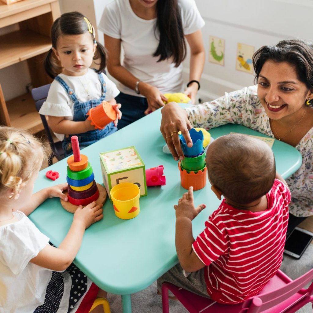 Group of children at a table in childcare facility